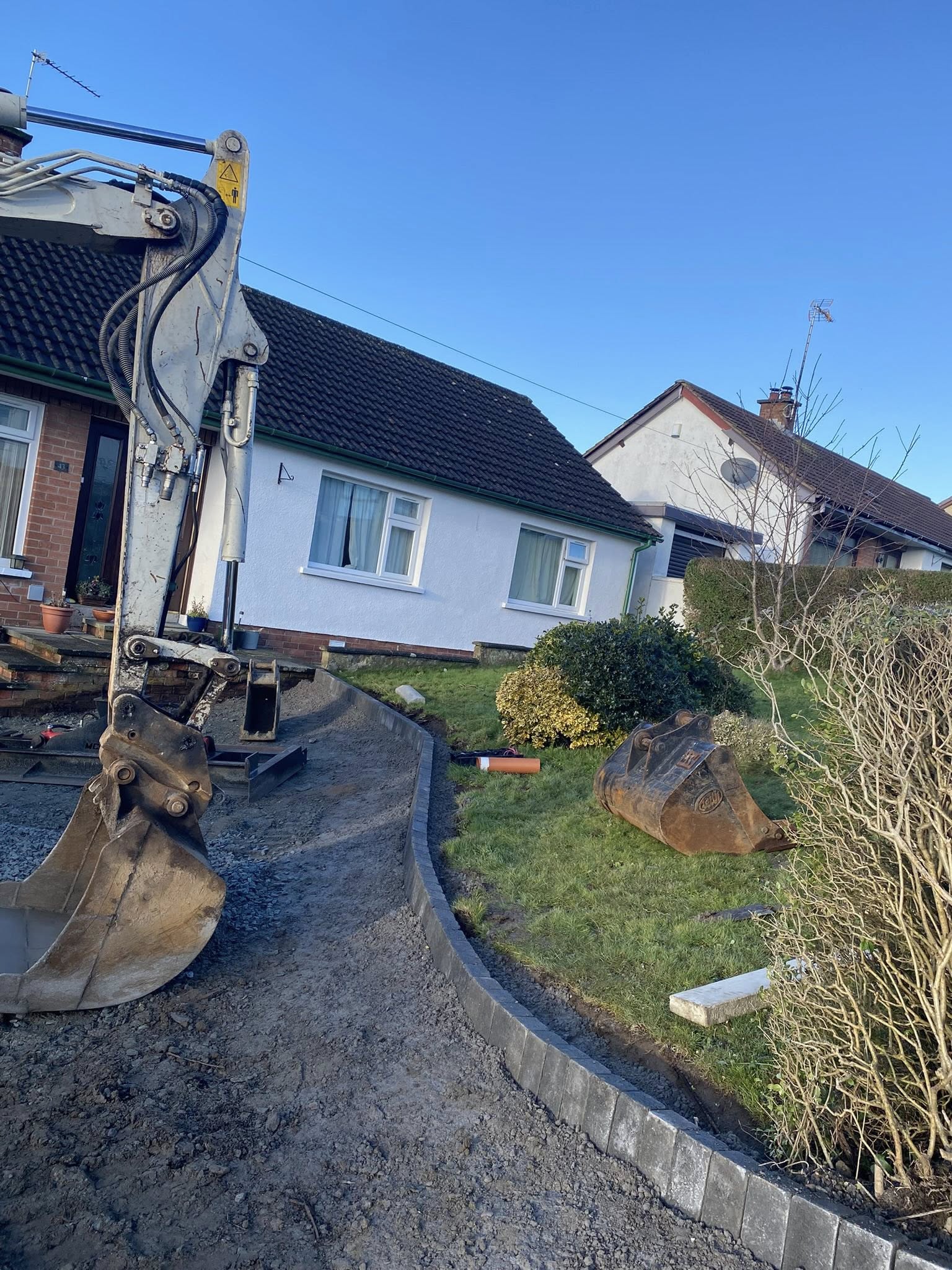 Ground preparation work before driveway installation