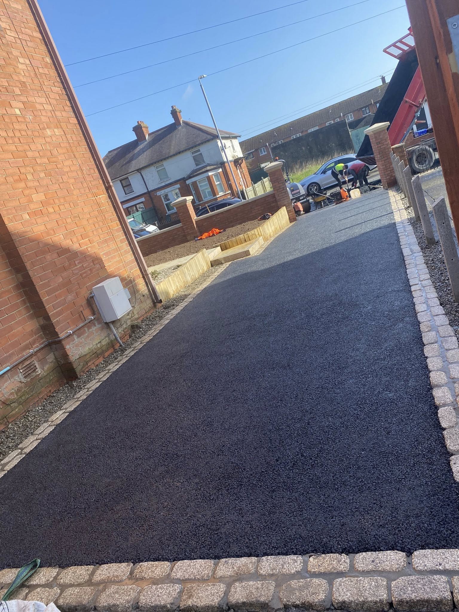 Finished driveway with neat block paving edges and durable surfacing