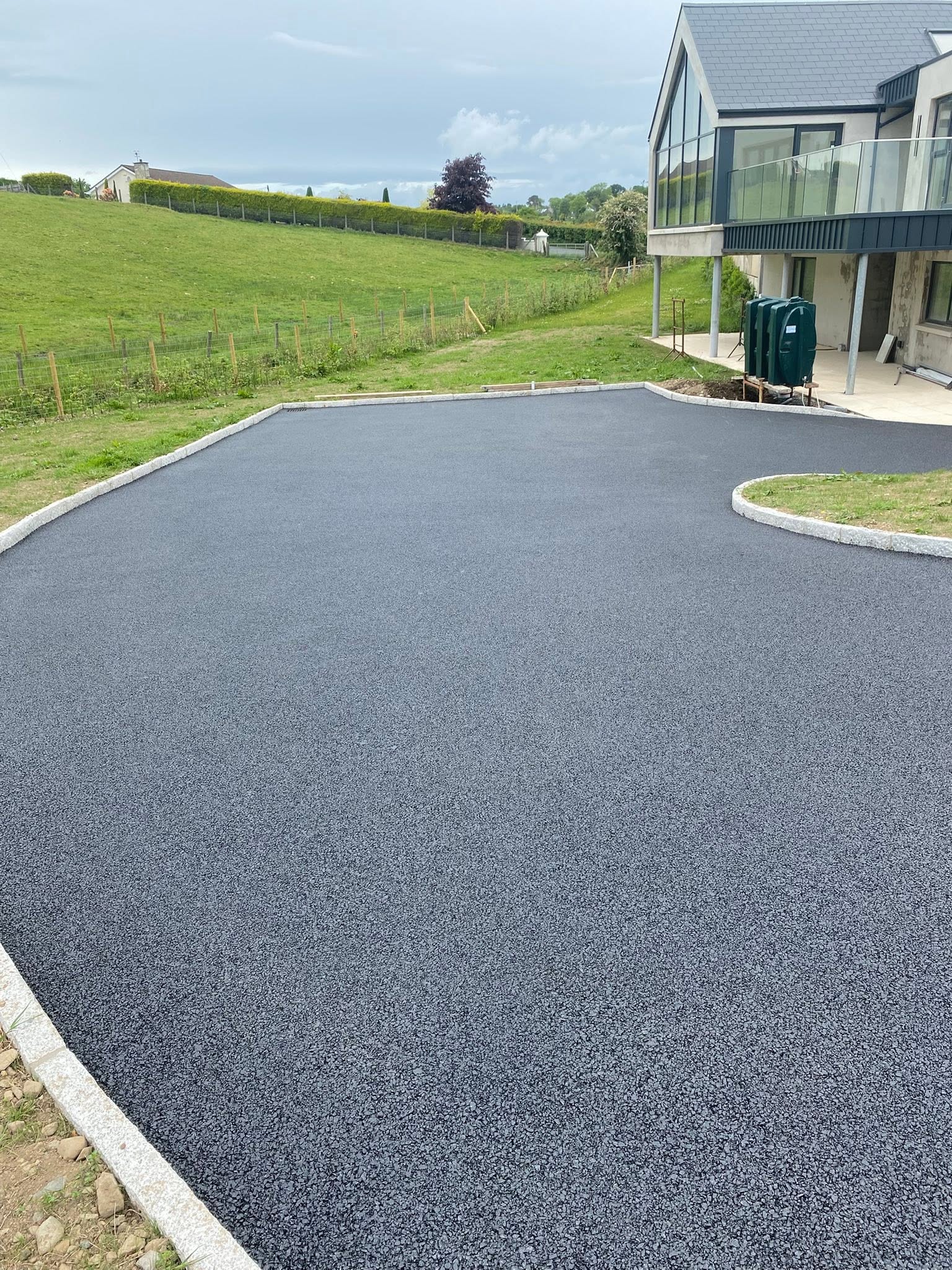 Freshly laid tarmac driveway with a smooth finish
