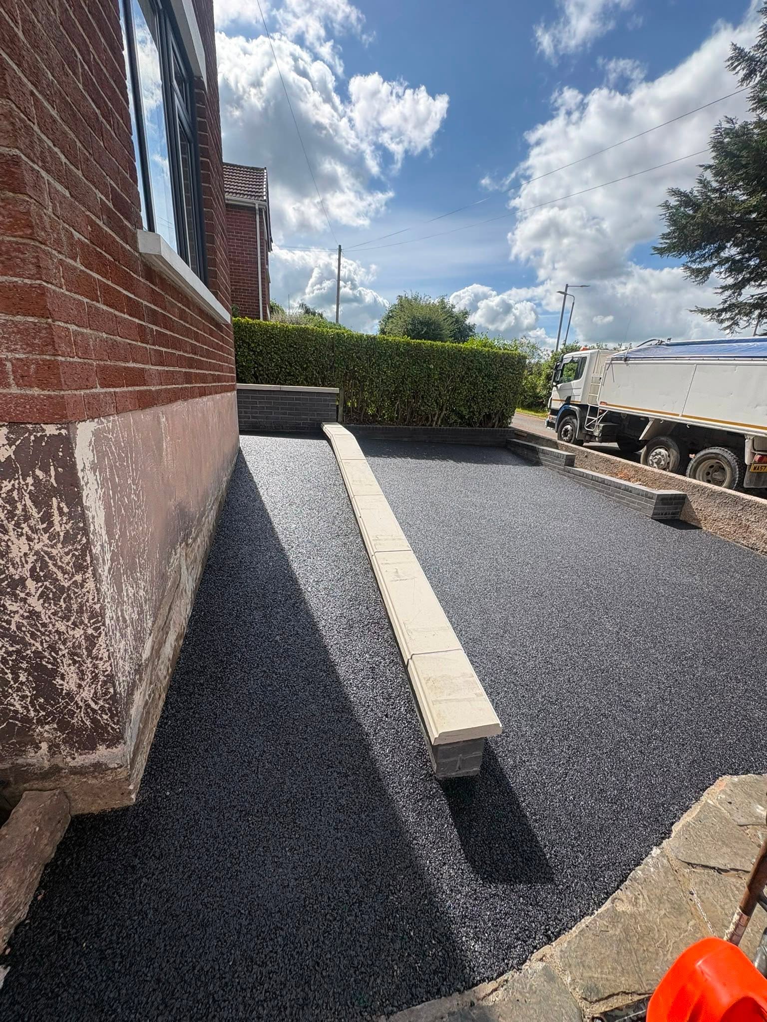 New tarmac entrance and driveway at a family home
