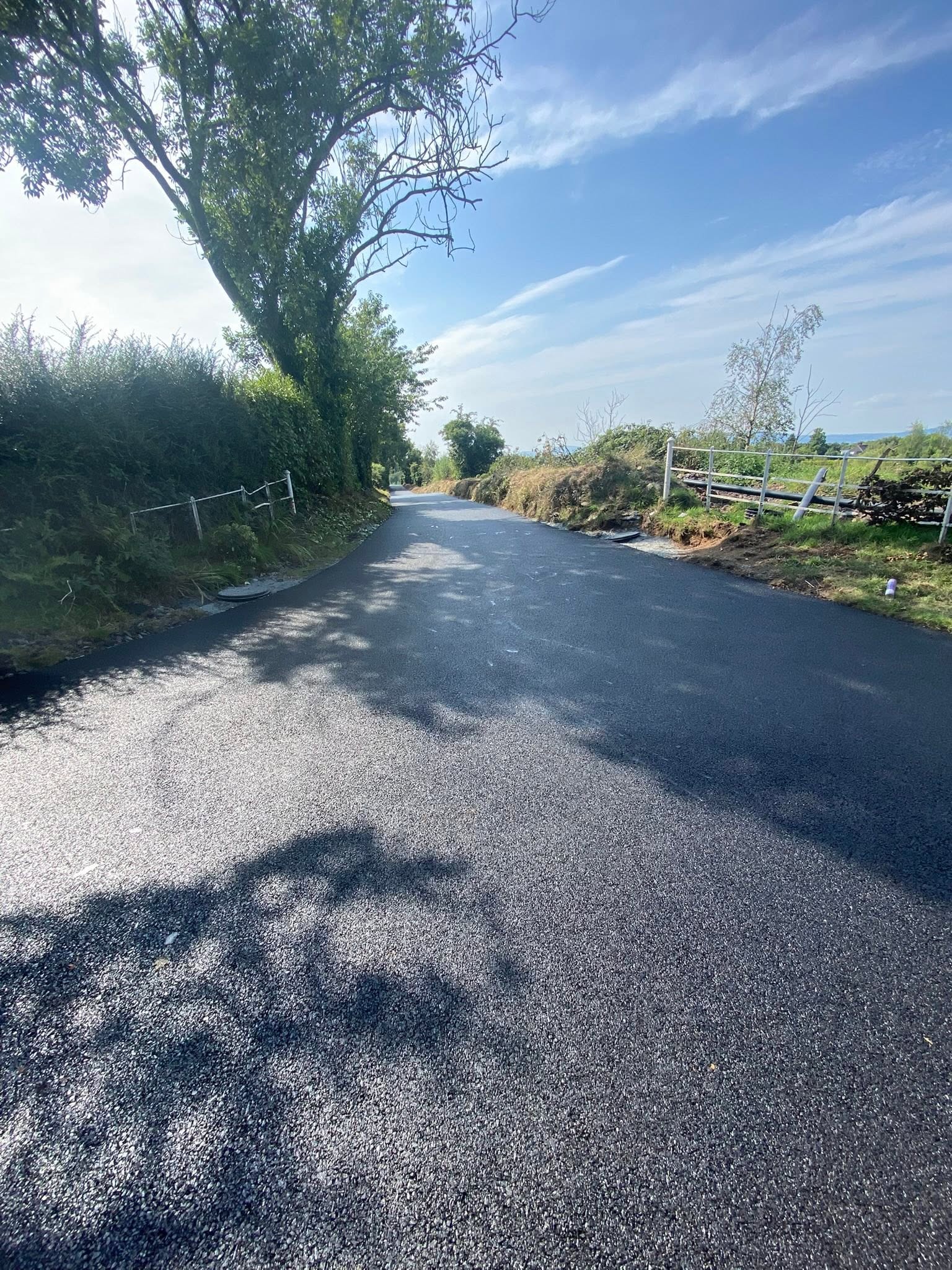 Smooth new tarmac road surface after resurfacing