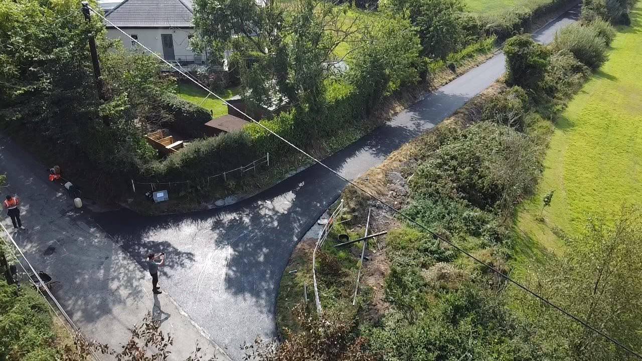 Newly resurfaced road with a smooth asphalt finish